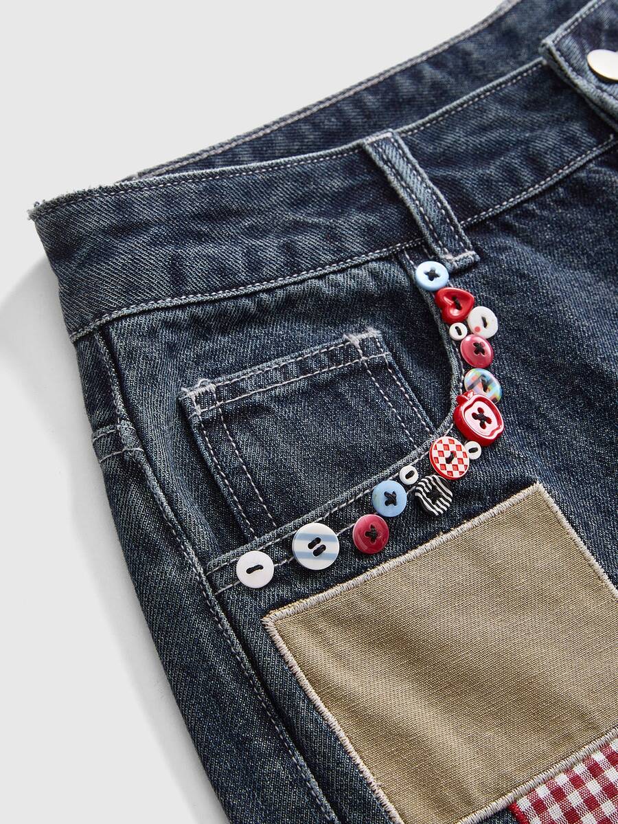 Women's loose baggy blue denim jeans featuring embroidered dragonfly and ladybug patch appliques, front pockets, and a straight-leg cut.