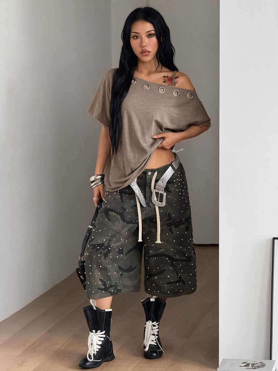 Women's casual loose fit cold shoulder cotton t-shirt with asymmetrical cutout neckline and short sleeves.