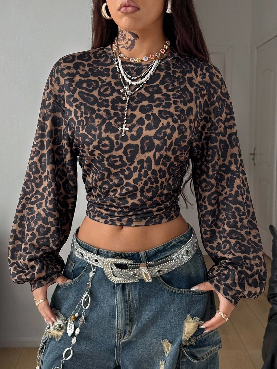 Women's brown waist-cinching sweatshirt featuring a round neck, drop shoulder long sleeves, and rib-knit cuffs.