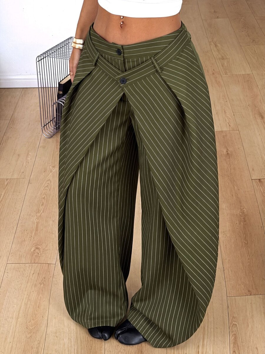 Women's loose fit pleated wide leg pants in royal blue pinstripe woven fabric with zipper fly closure.