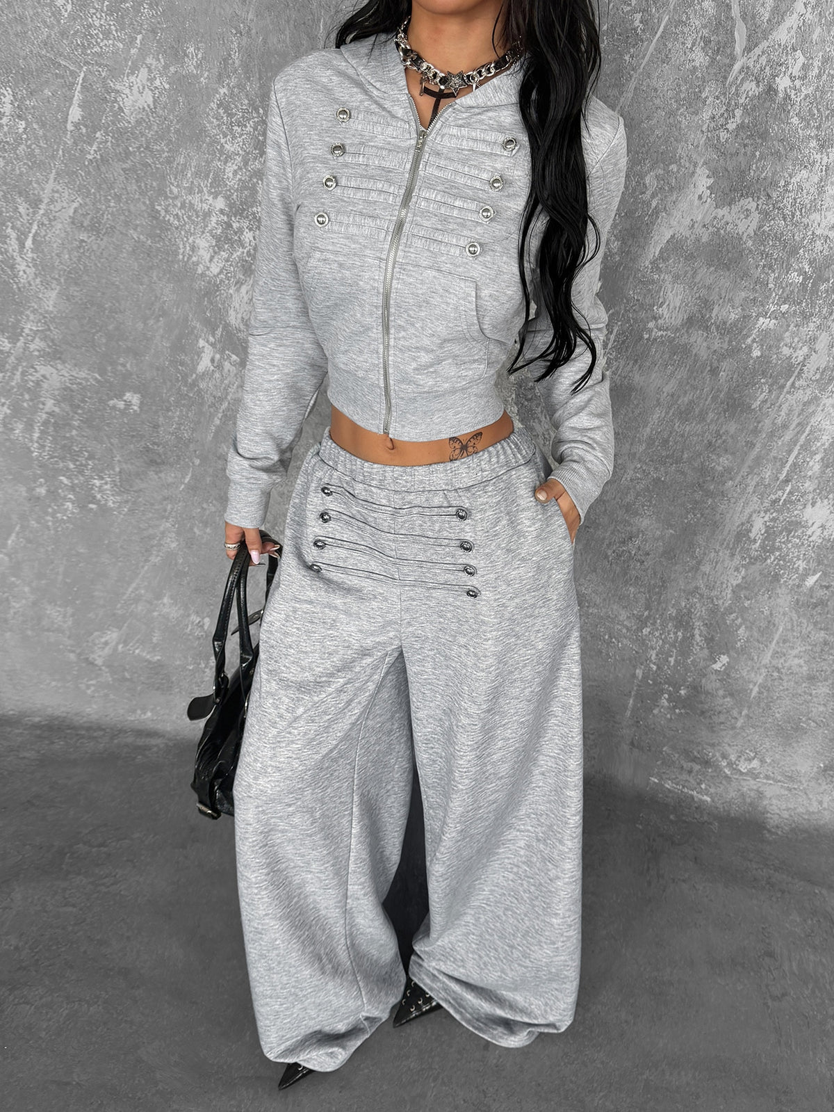Women's loose fit wide leg graphic sweatpants in light grey with an elastic drawstring waistband