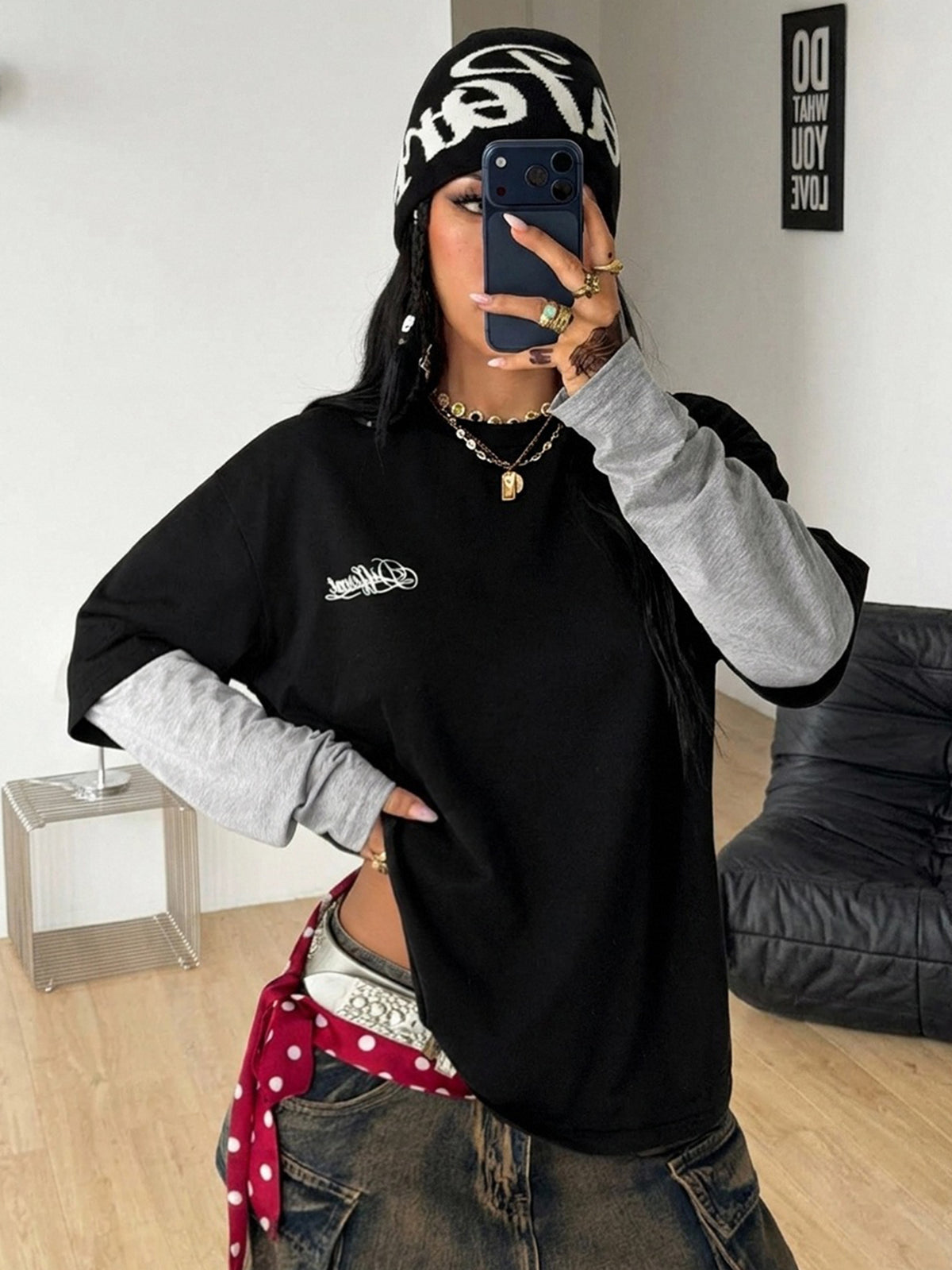 Women's casual graphic long sleeve t-shirt with a round neck, drop shoulder sleeves, and loose relaxed fit.