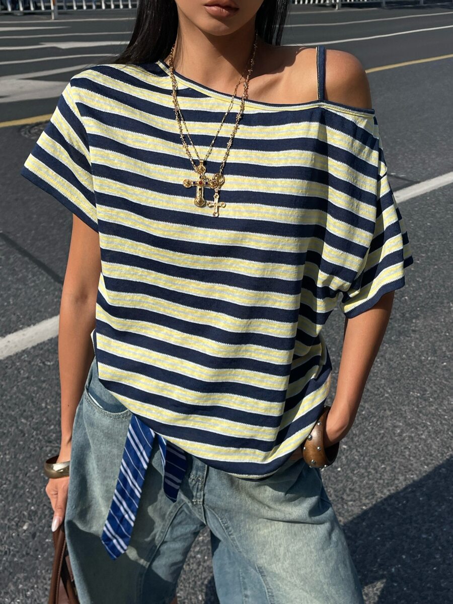 Women's casual loose fit cold shoulder cotton t-shirt with asymmetrical cutout neckline and short sleeves.