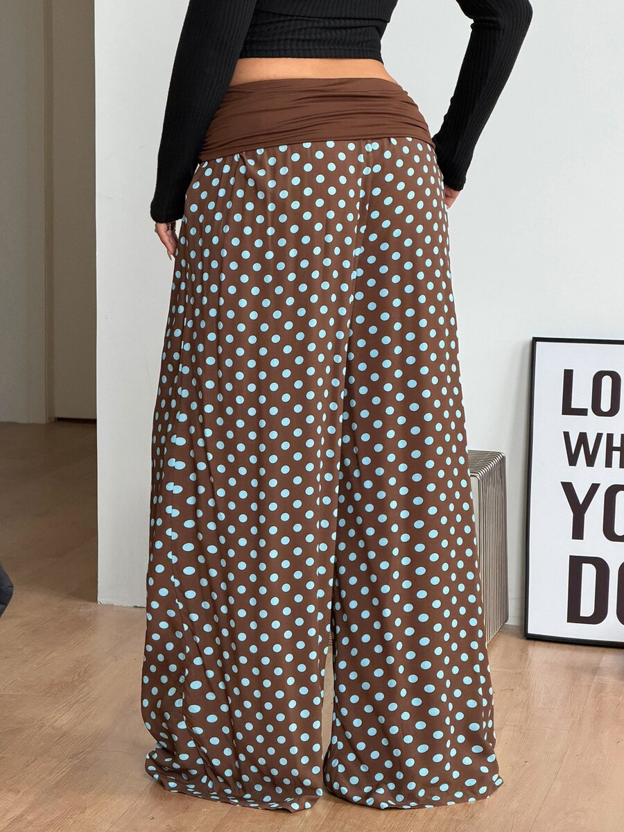 Women's plus size wide leg cotton pants featuring a relaxed loose fit and high waist design.