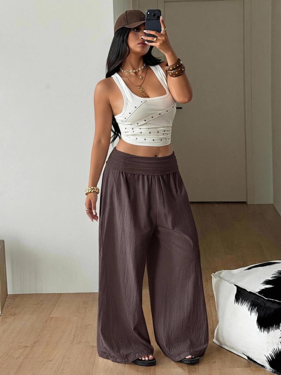 Women's plus size wide leg cotton pants featuring a relaxed loose fit and high waist design.