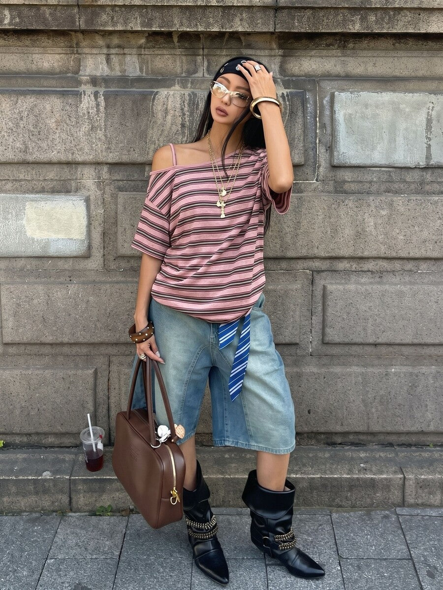 Women's casual loose fit cold shoulder cotton t-shirt with asymmetrical cutout neckline and short sleeves.