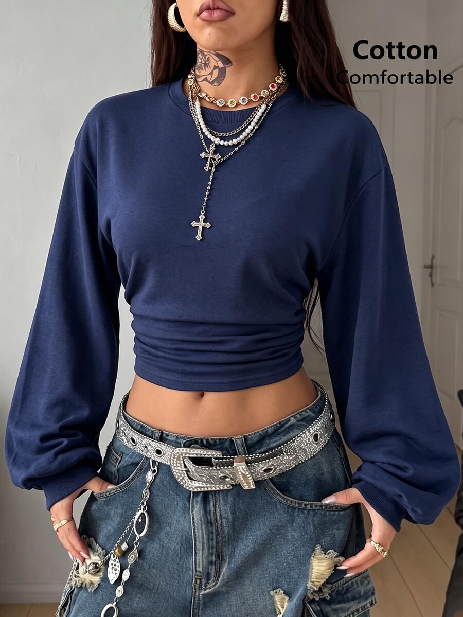 Women's brown waist-cinching sweatshirt featuring a round neck, drop shoulder long sleeves, and rib-knit cuffs.