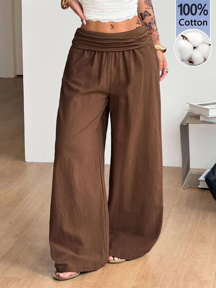 Women's plus size wide leg cotton pants featuring a relaxed loose fit and high waist design.