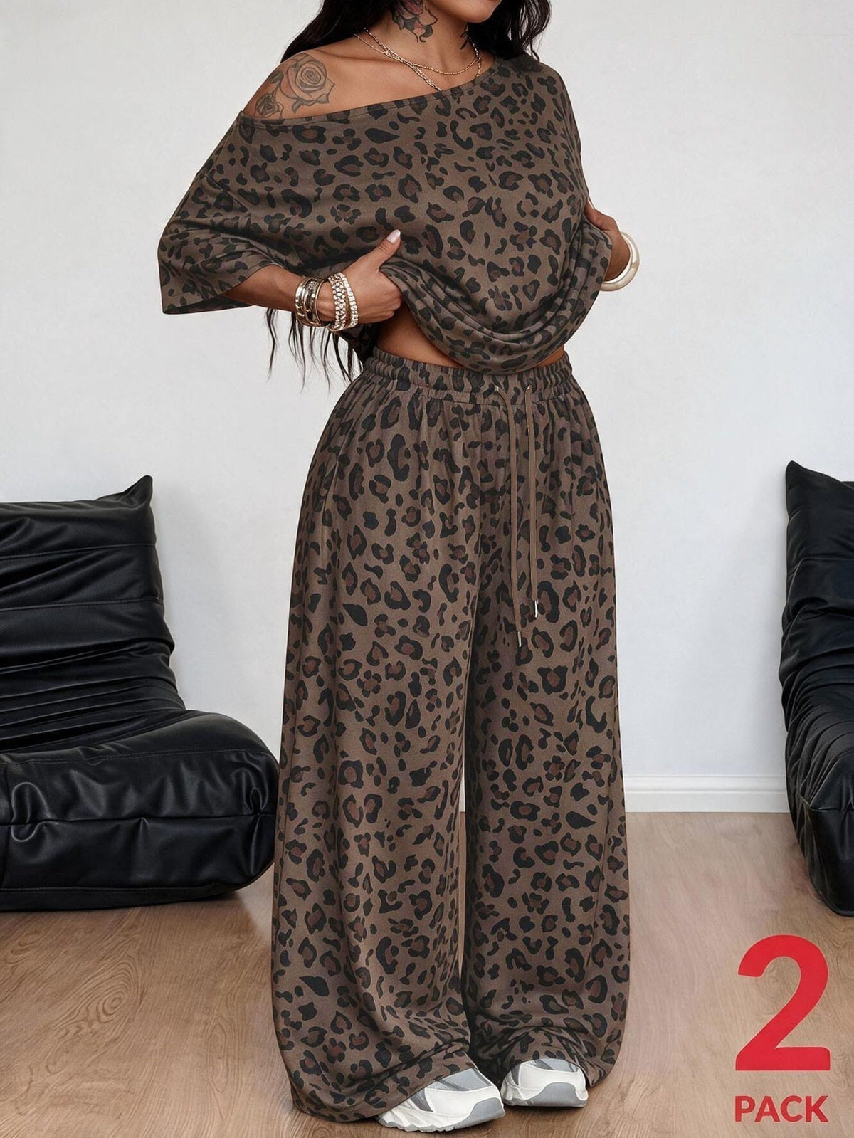 Women's two-piece lounge set featuring a loose drop shoulder asymmetrical neck short sleeve t-shirt and wide-leg knit pants with pockets.