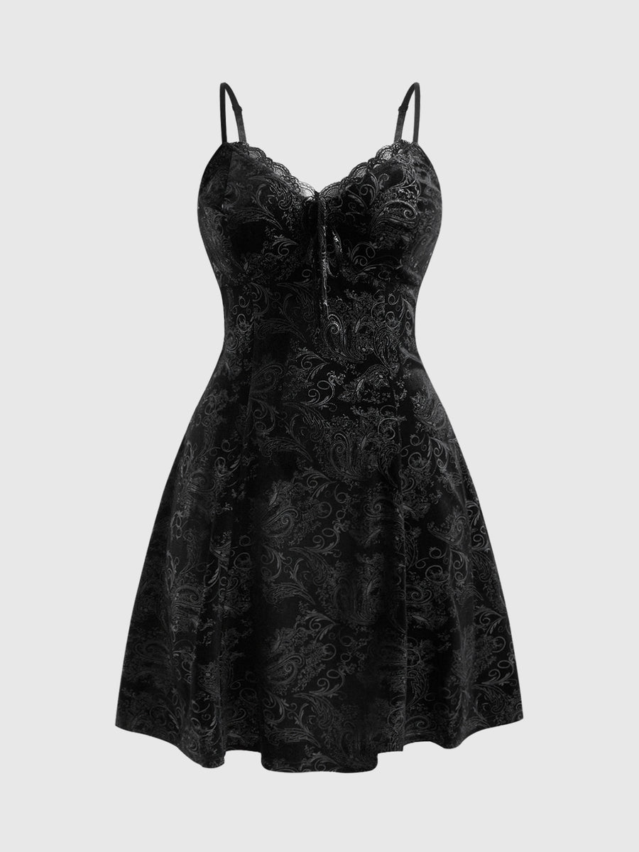 Plus size velvet slip dress featuring delicate contrast lace trim, spaghetti straps, and flared mini skirt with matching arm sleeves.