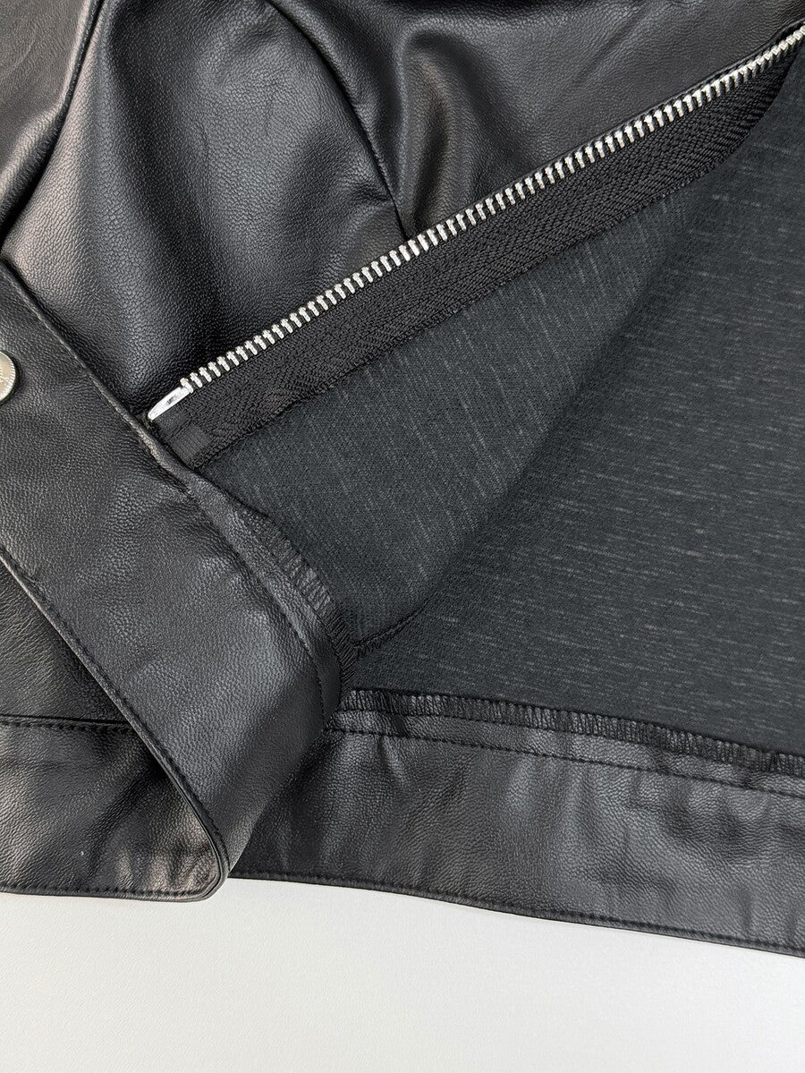 Front view of a women's black cropped PU leather jacket featuring a stand collar, long sleeves, and front zipper closure.