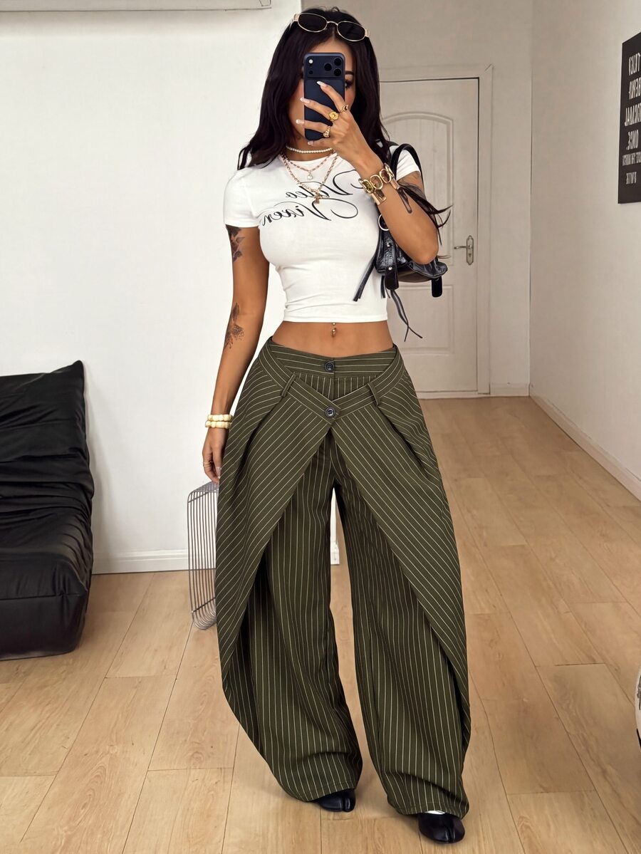 Women's loose fit pleated wide leg pants in royal blue pinstripe woven fabric with zipper fly closure.