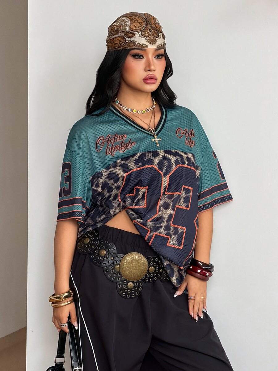 Navy blue plus size mesh baseball jersey t-shirt featuring a V-neck, raglan half sleeves, and sporty letter detailing.