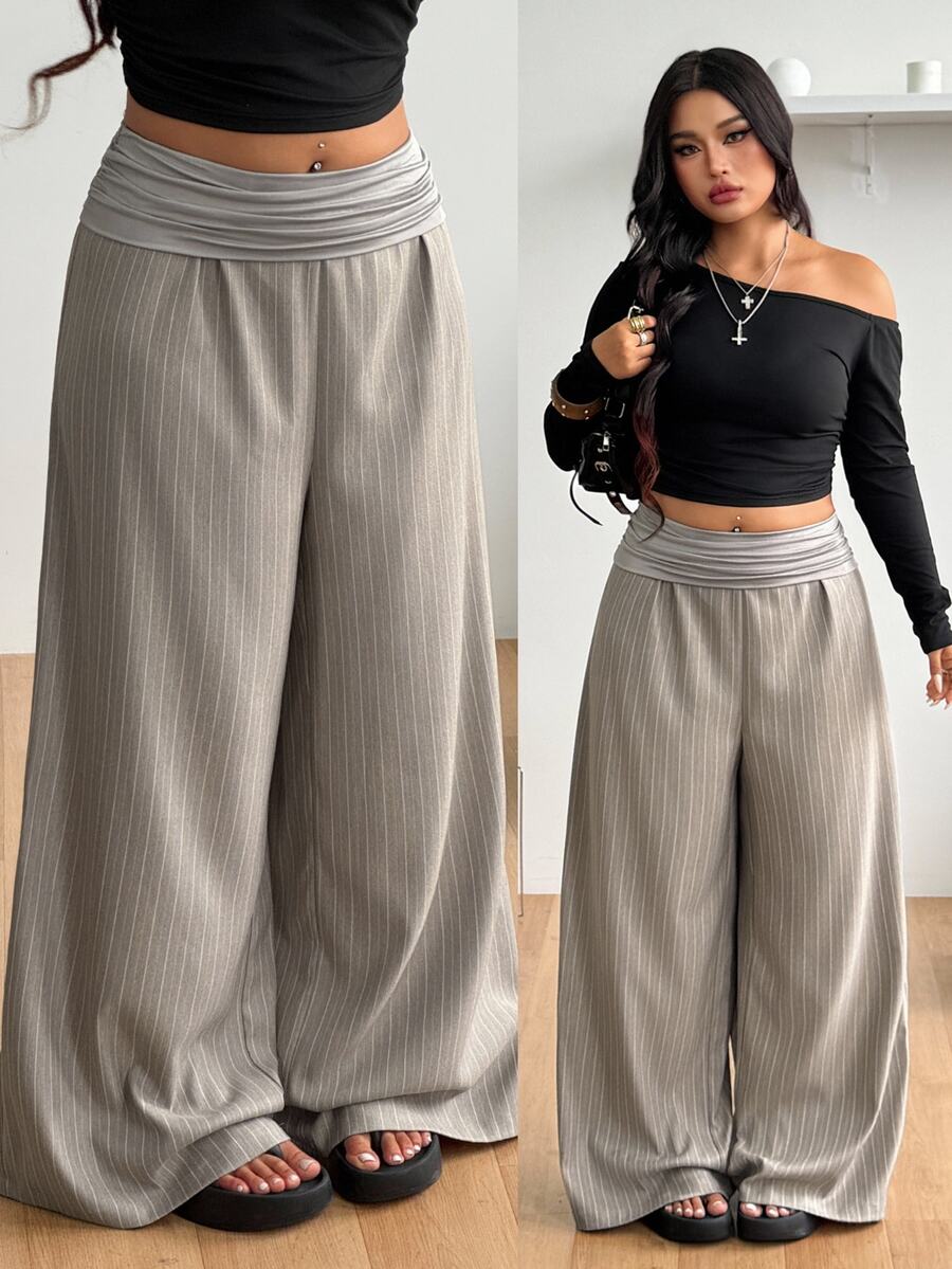 Women's plus size wide leg cotton pants featuring a relaxed loose fit and high waist design.