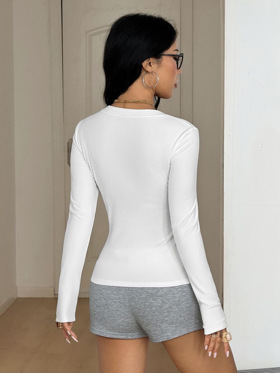 Women's slim fit long sleeve V-neck t-shirt with ruched bustier details in knitted stretch fabric