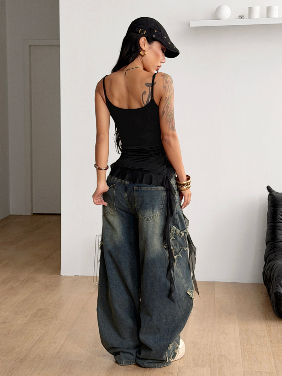 Women's slim fit casual cami top featuring spaghetti straps, ruched detailing, and a ruffle hem.