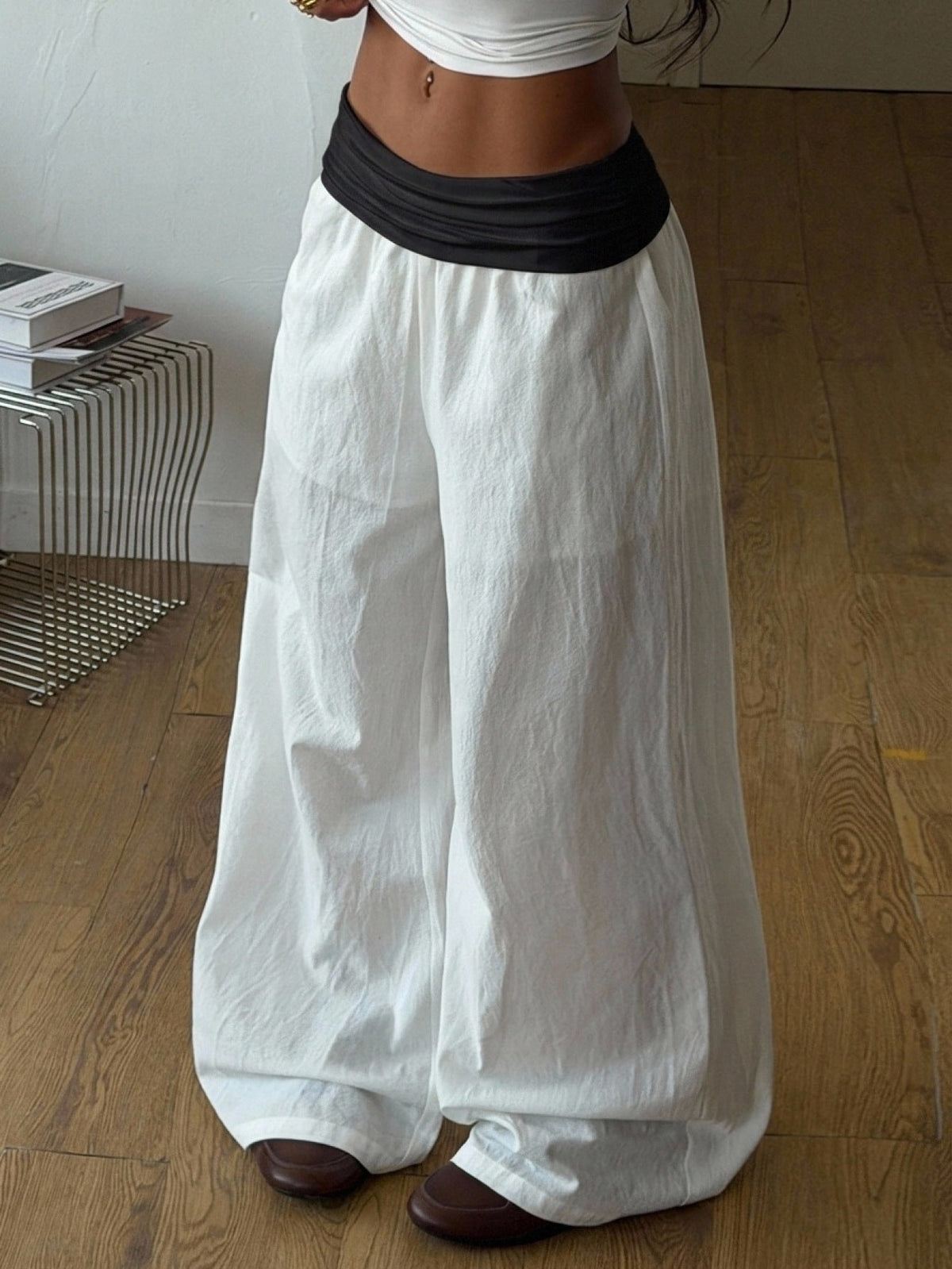 Women's plus size wide leg cotton pants featuring a relaxed loose fit and high waist design.