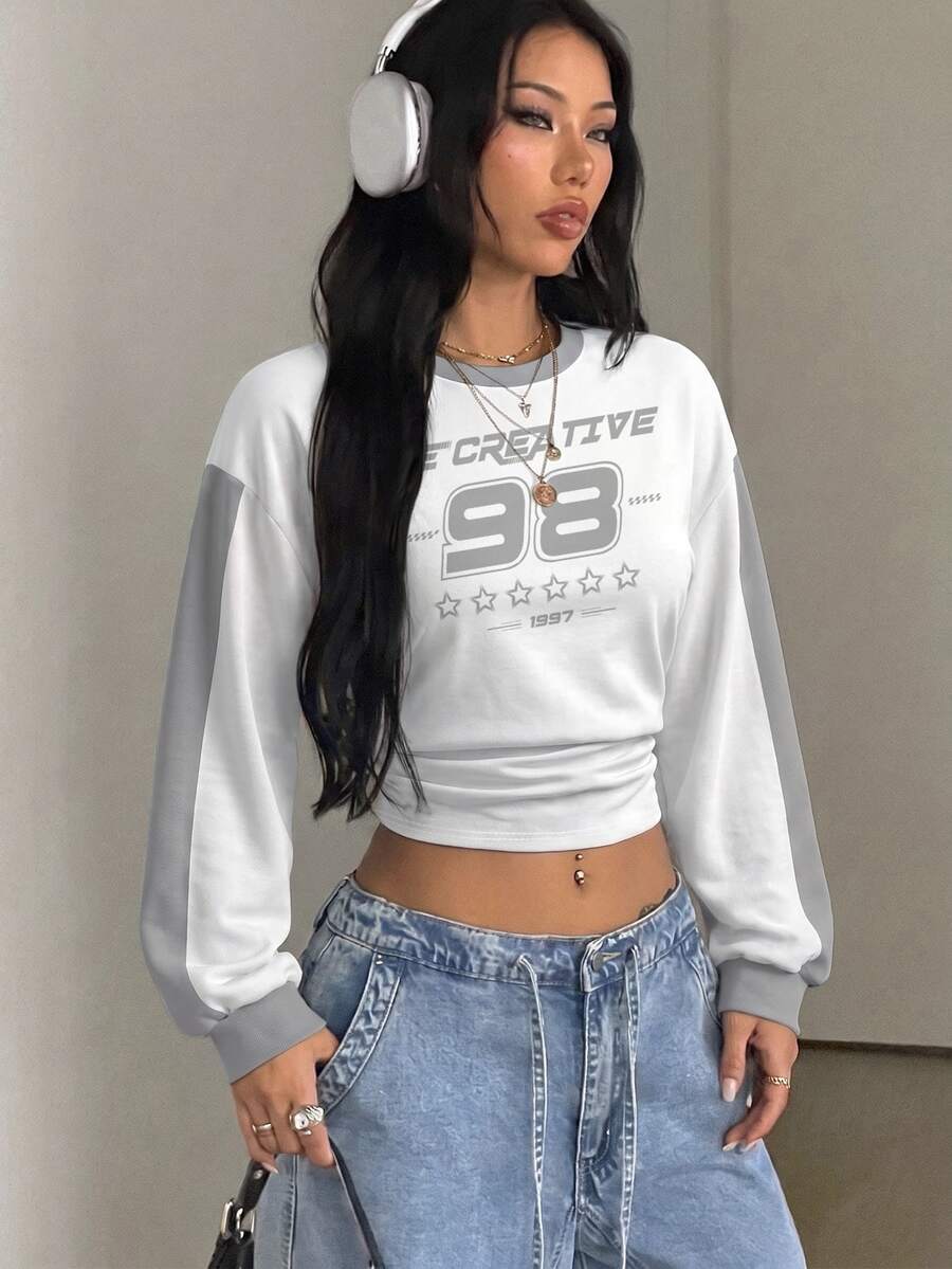 Women's brown waist-cinching sweatshirt featuring a round neck, drop shoulder long sleeves, and rib-knit cuffs.