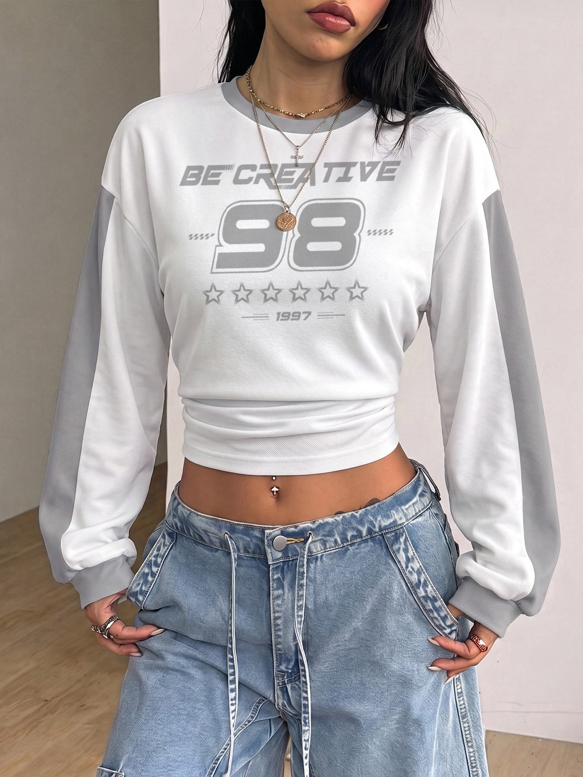 Women's brown waist-cinching sweatshirt featuring a round neck, drop shoulder long sleeves, and rib-knit cuffs.