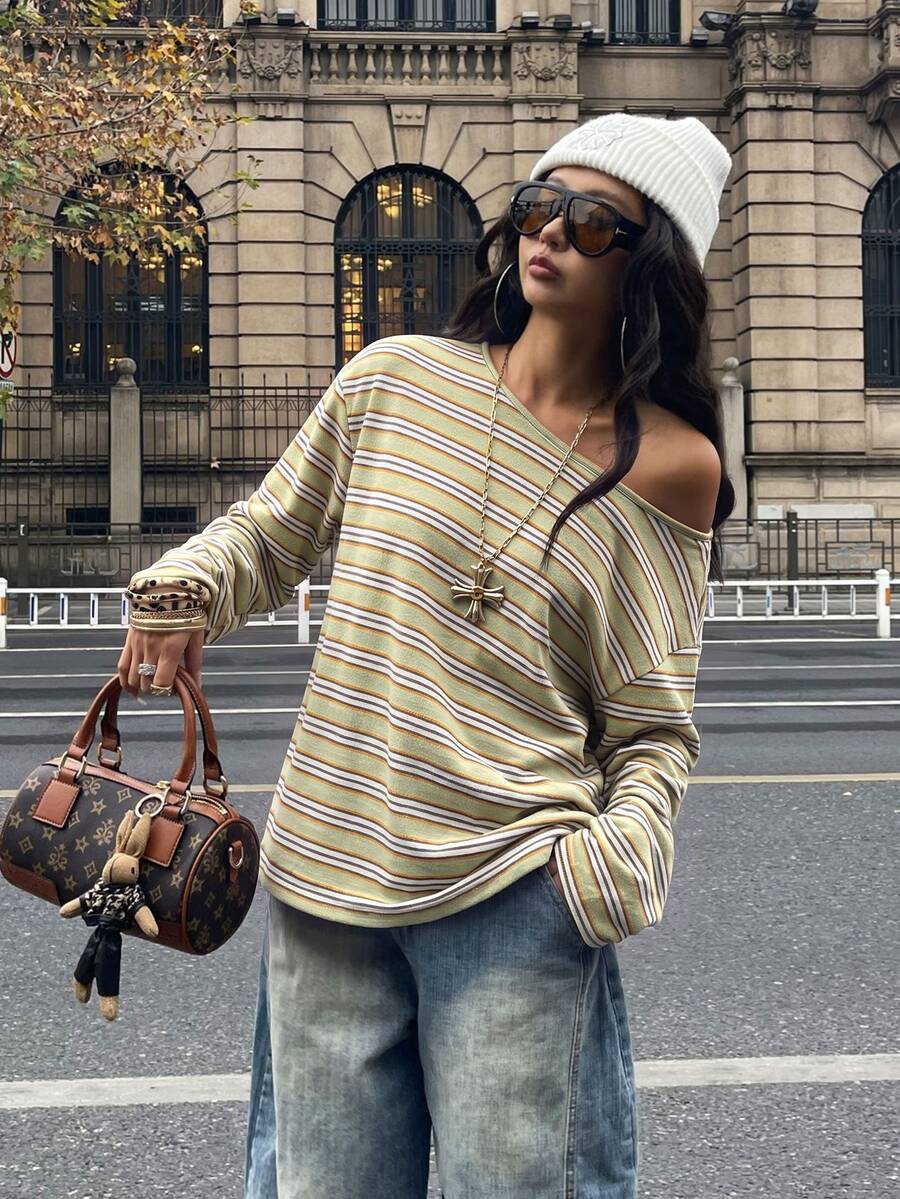 Women's brown striped boat neck long sleeve raglan T-shirt with a loose casual fit