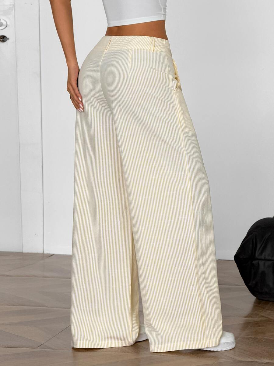 Women's casual straight leg striped woven pants featuring a low waist and zipper fly closure.