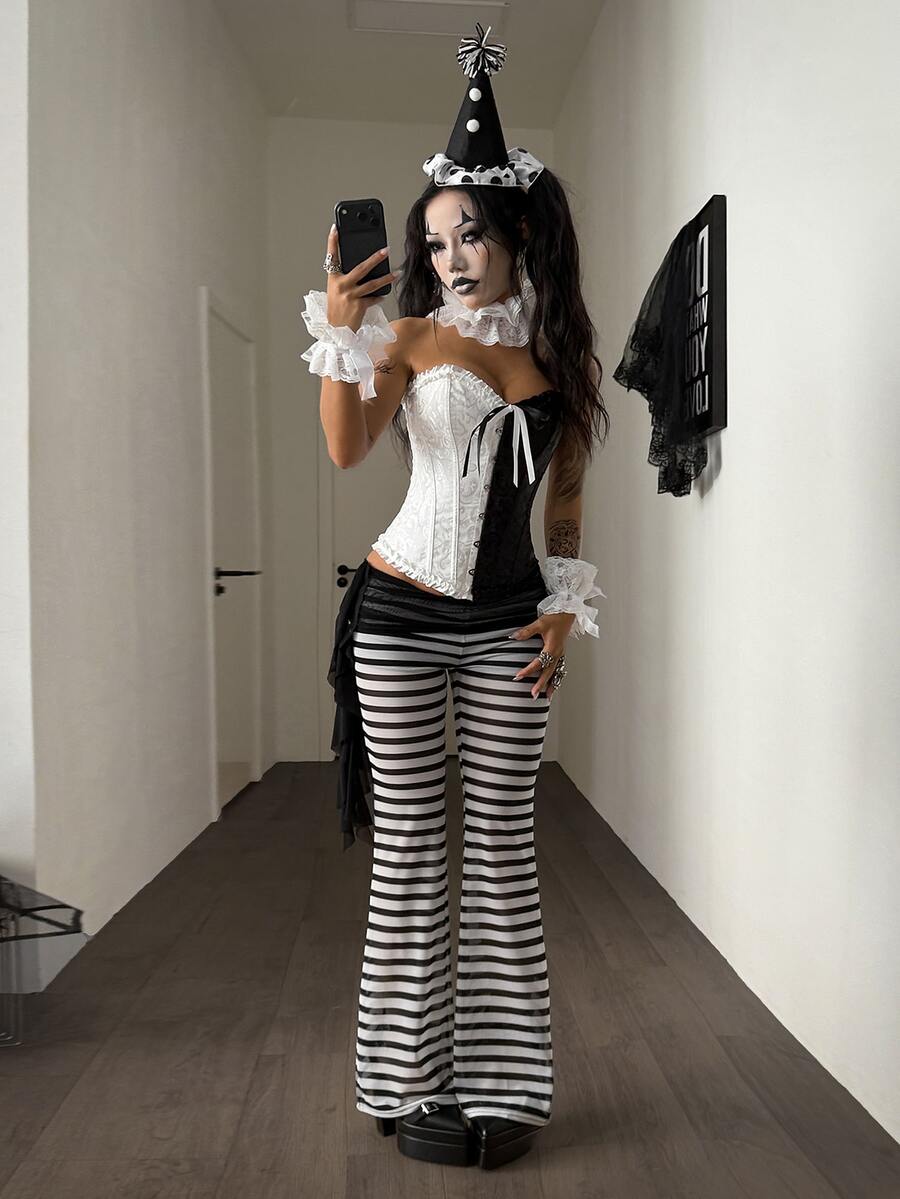 Women's black and white polka dot flare leg pants with side drawstring and ruched details
