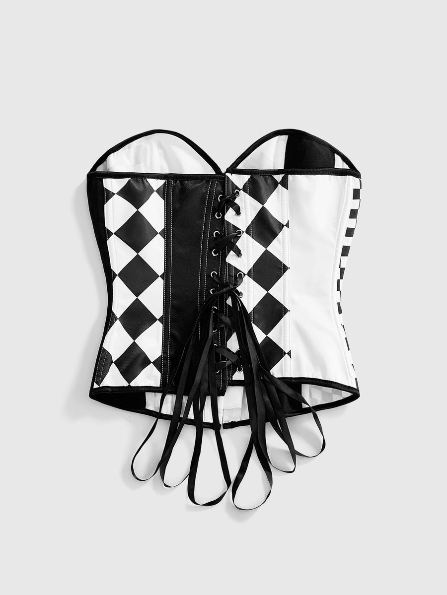 Black and white checkerboard pattern strapless bandeau bodysuit top with lace-up front, button detailing, and an asymmetrical hem in smooth satin.