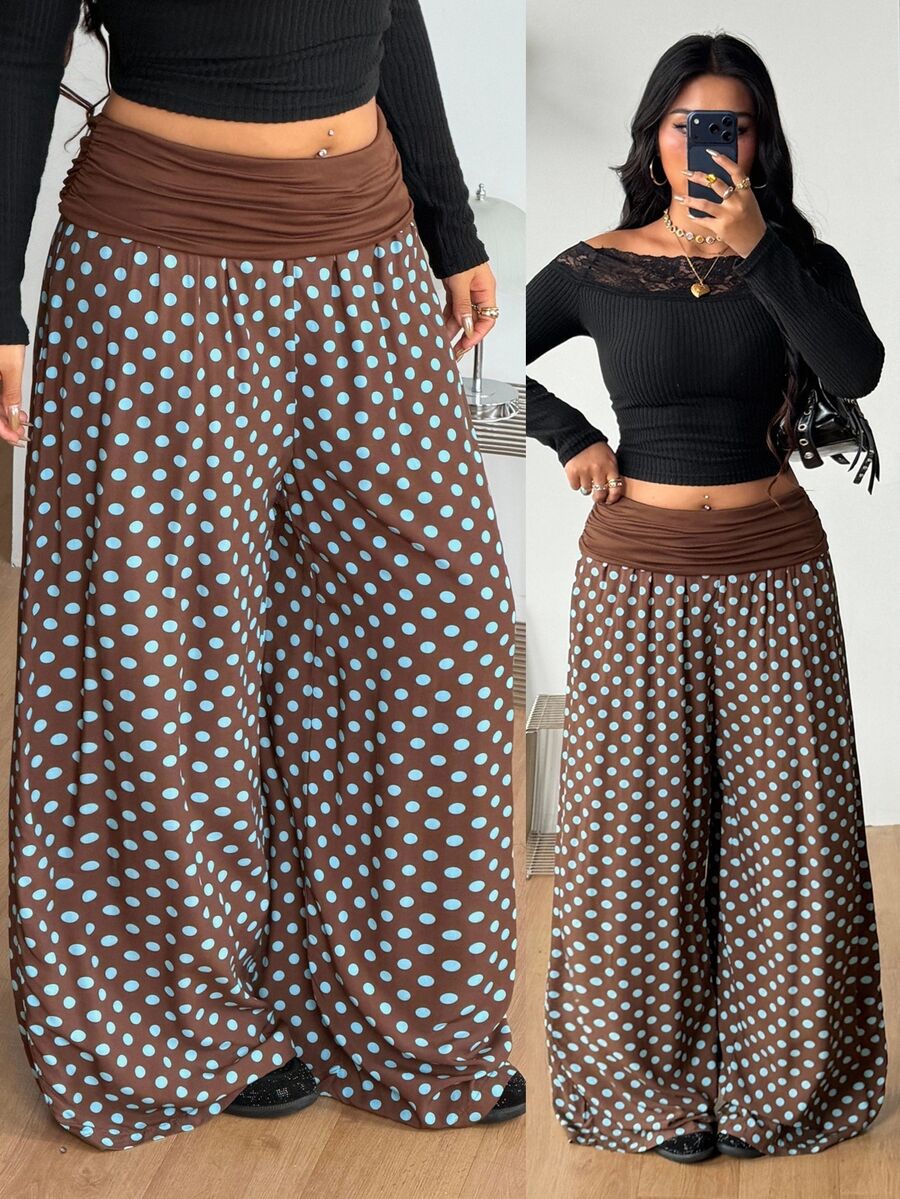 Women's plus size wide leg cotton pants featuring a relaxed loose fit and high waist design.