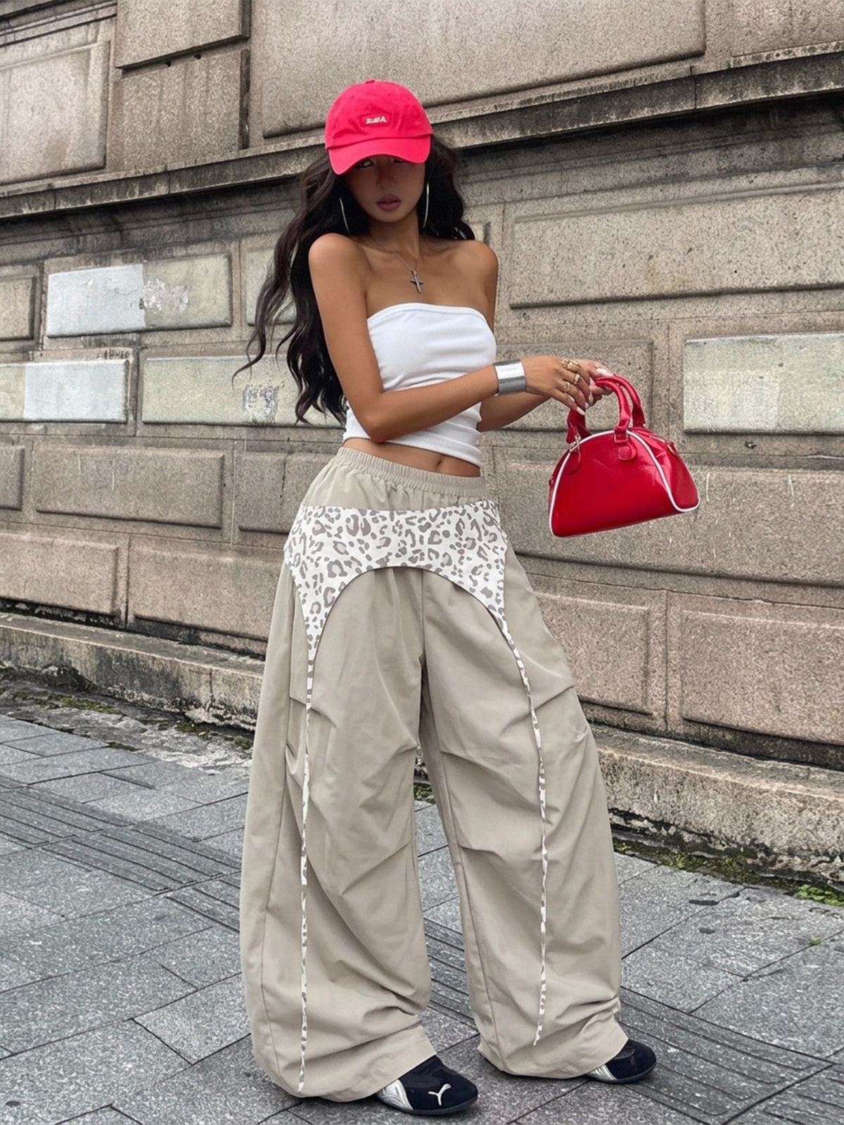 Women's casual wide leg long pants featuring an elastic drawstring waistband and loose fit silhouette.