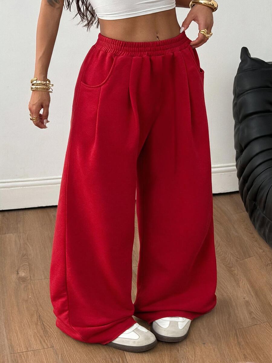 Women's loose wide leg casual sweatpants with an elastic waistband and side pockets