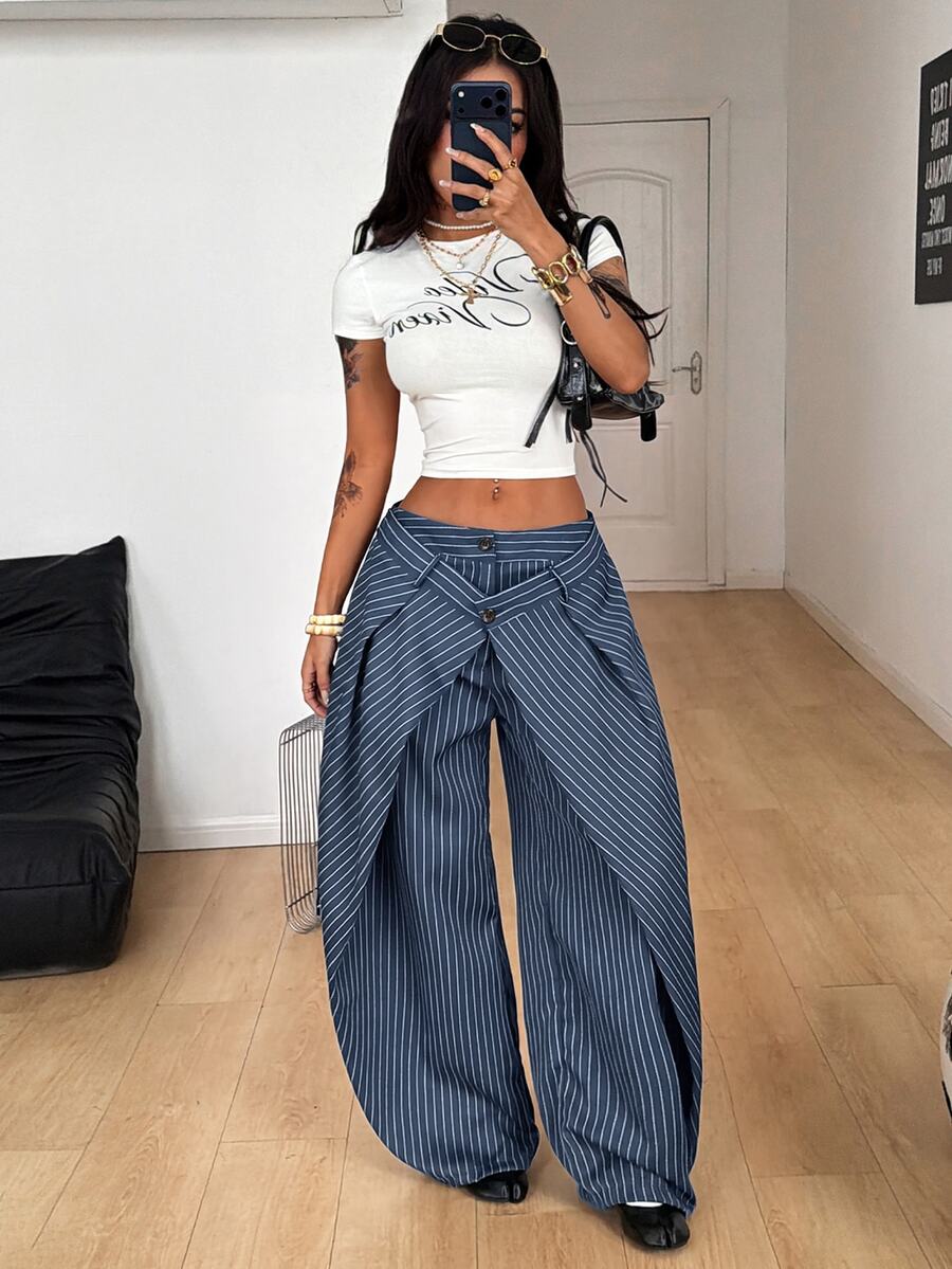 Women's loose fit pleated wide leg pants in royal blue pinstripe woven fabric with zipper fly closure.