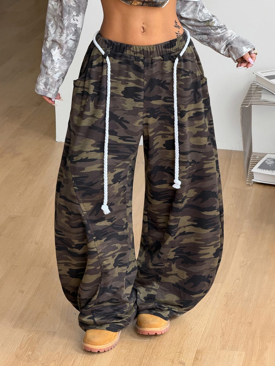 Women's casual grey plaid sweatpants featuring an elastic drawstring waistband, side pockets, and a relaxed loose fit.