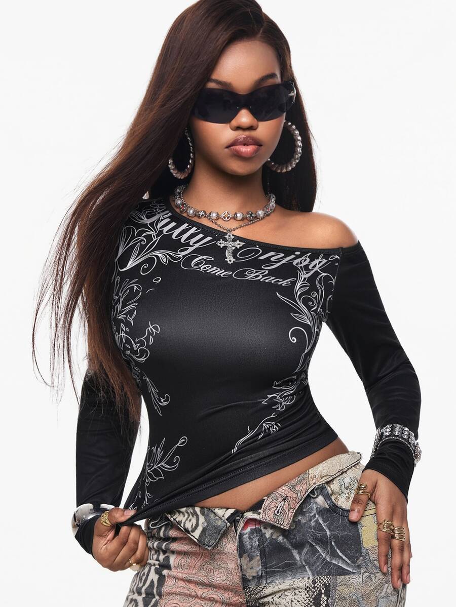 Women's slim fit long sleeve knit top featuring an asymmetrical neckline and grommet eyelet detail