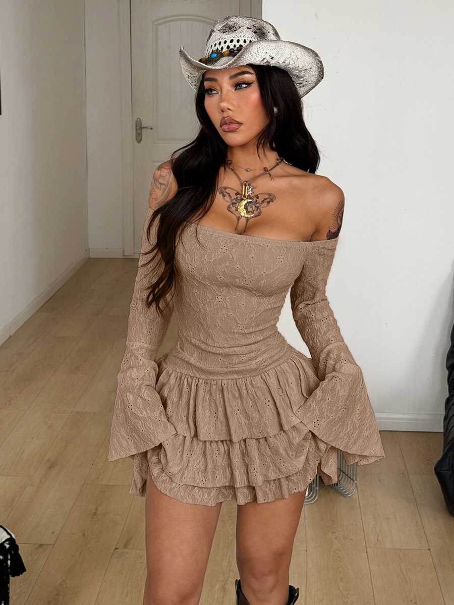 Front view of an off the shoulder tiered ruffle A-line mini dress with flare sleeves for women