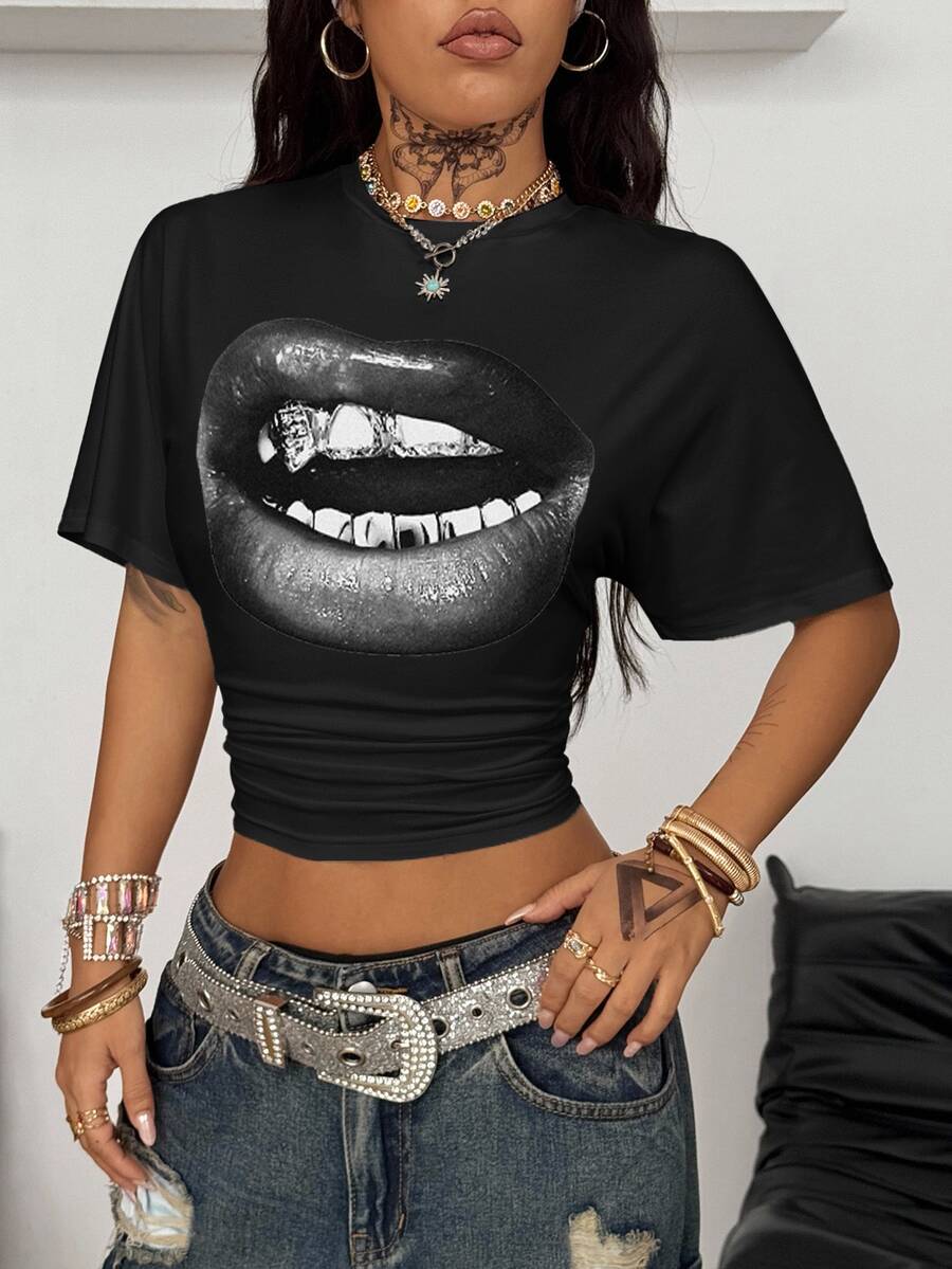 Women's striped short sleeve t-shirt featuring a casual drop shoulder design and round neckline.
