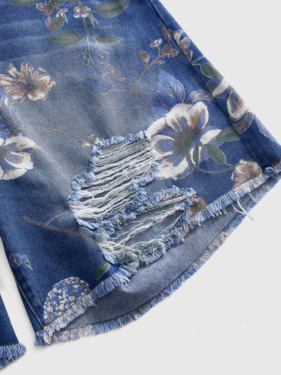 Women's loose wide-leg denim Bermuda shorts featuring vintage animal and paisley print with pockets and zipper fly.