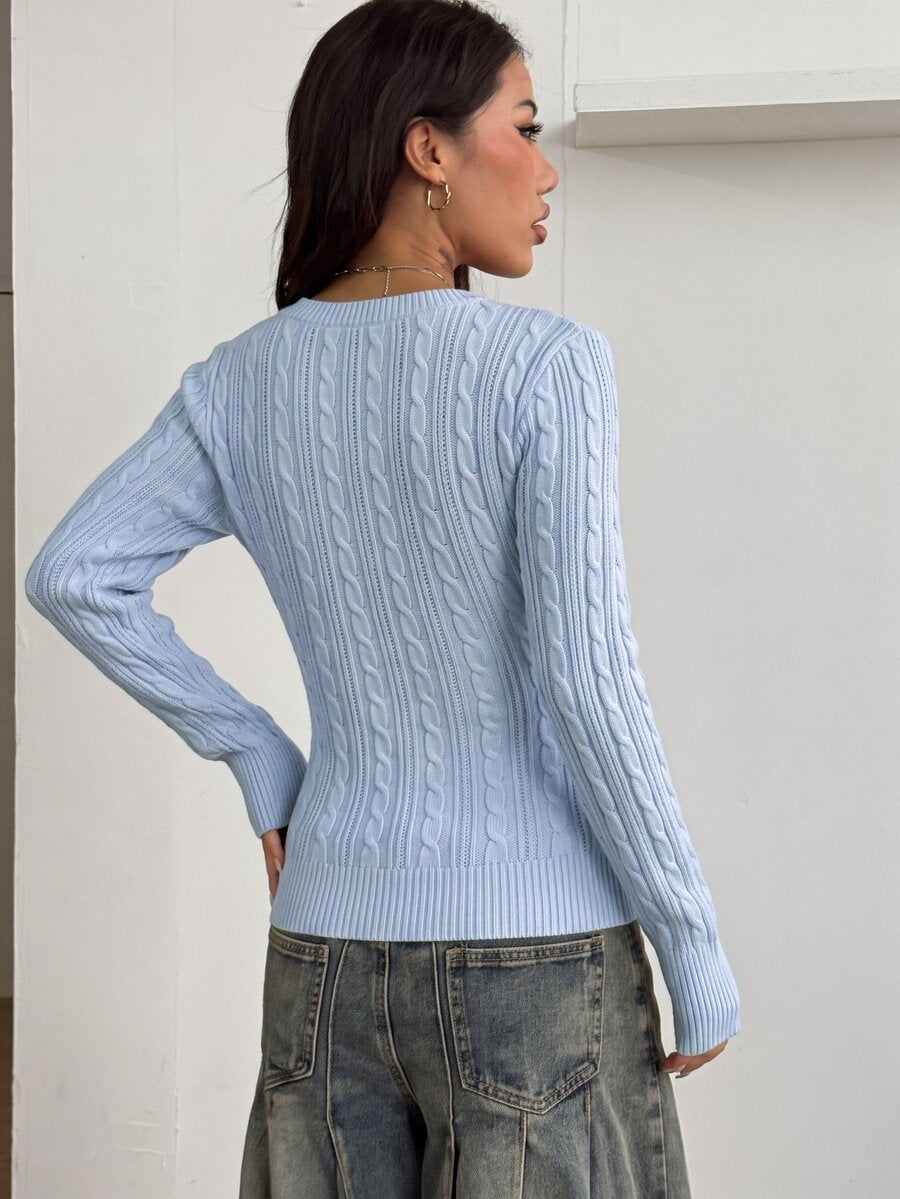 Women's slim fit cable-knit sweater with a V-neckline and long sleeves in solid green rib knit fabric.