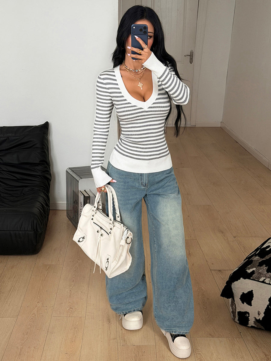 Women's slim fit cable-knit pullover sweater with deep V-neck and ribbed long sleeves