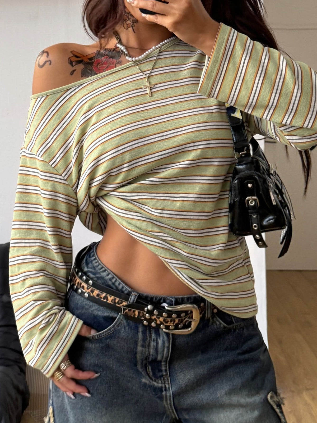Women's brown striped boat neck long sleeve raglan T-shirt with a loose casual fit