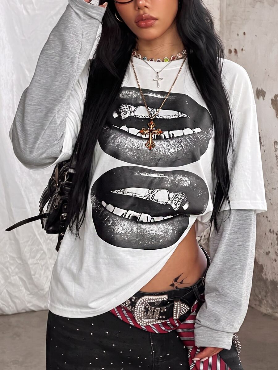 Women's casual graphic long sleeve t-shirt with a round neck, drop shoulder sleeves, and loose relaxed fit.