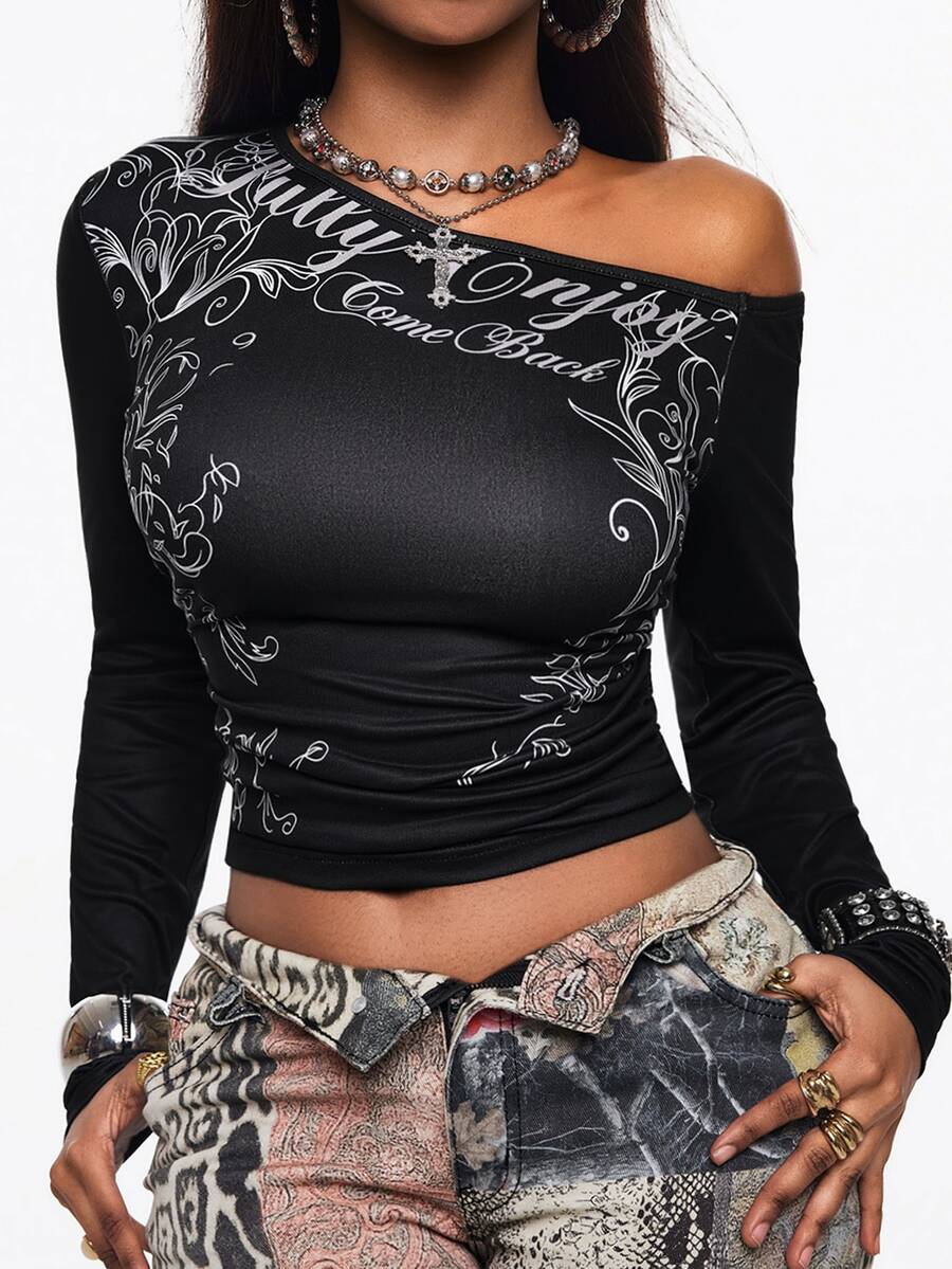 Women's slim fit long sleeve knit top featuring an asymmetrical neckline and grommet eyelet detail