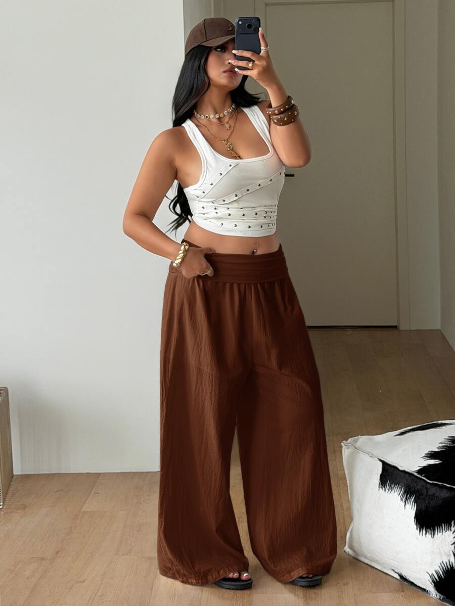 Women's plus size wide leg cotton pants featuring a relaxed loose fit and high waist design.