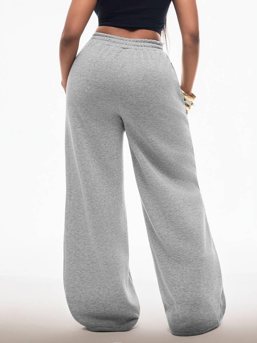 Women's striped straight leg casual trousers with elastic mid waist and side pockets