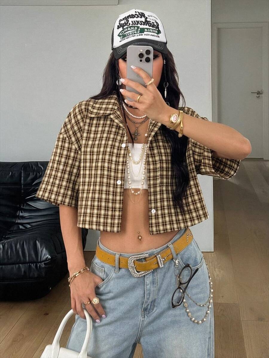 Women's plaid crop shirt with button front, chest pocket, short sleeves, and loose casual fit.