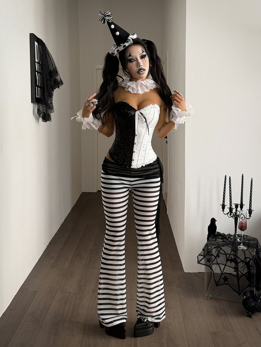 Women's black and white polka dot flare leg pants with side drawstring and ruched details