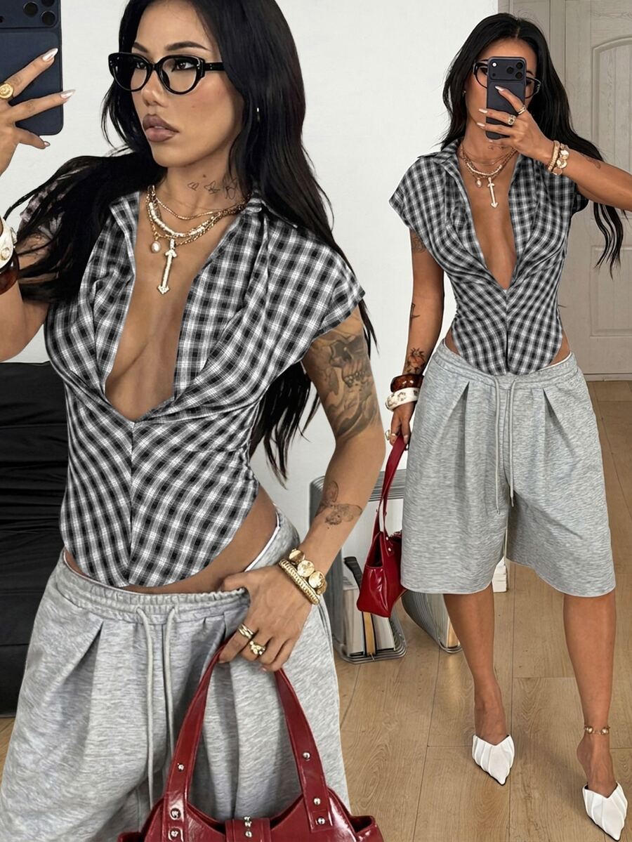 Women's plaid short sleeve shirt featuring a lapel collar and backless design in woven fabric.