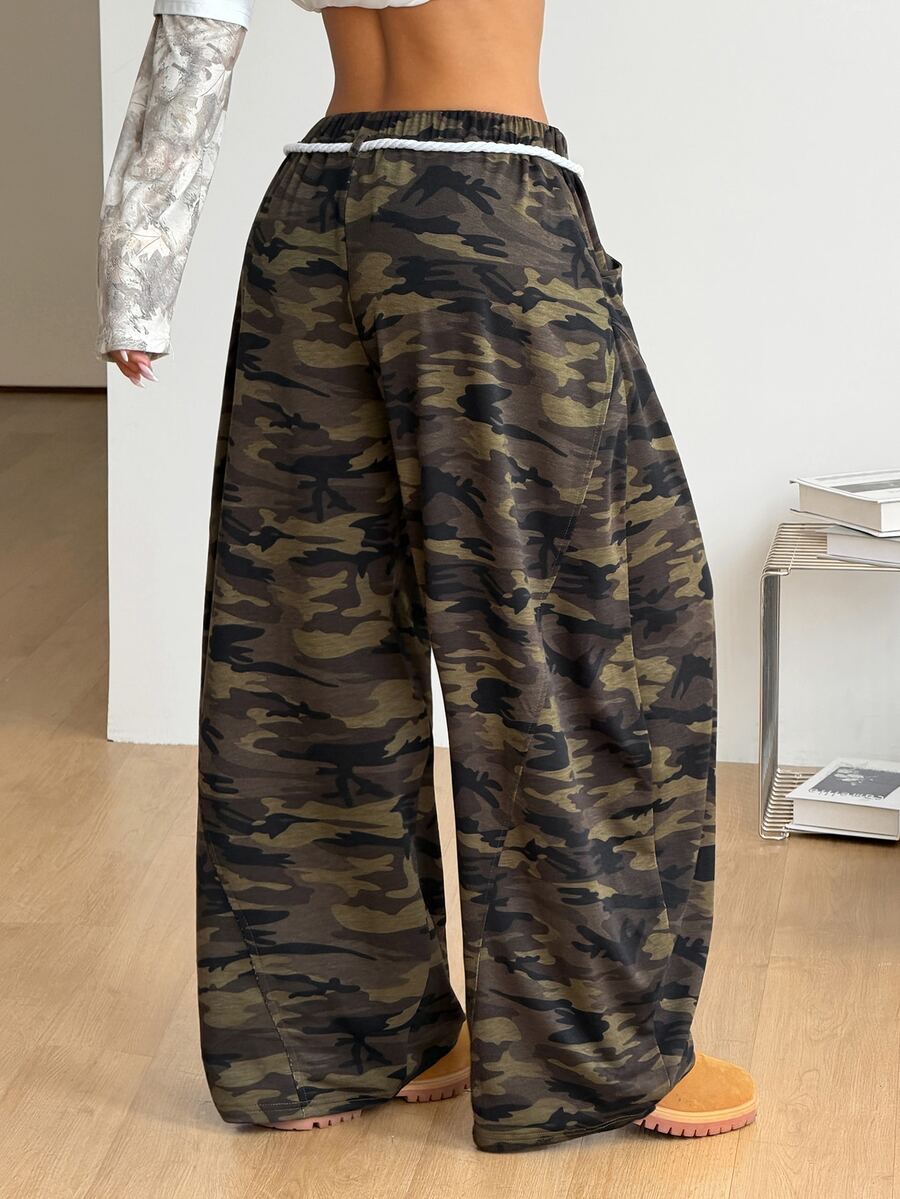 Women's casual grey plaid sweatpants featuring an elastic drawstring waistband, side pockets, and a relaxed loose fit.