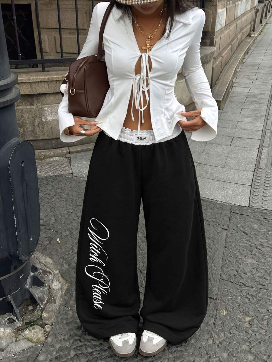 Women's striped straight leg casual trousers with elastic mid waist and side pockets