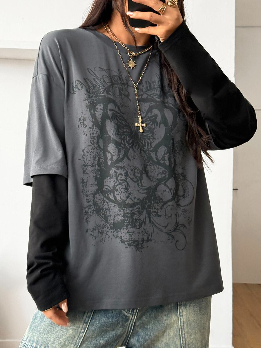 Women's casual graphic long sleeve t-shirt with a round neck, drop shoulder sleeves, and loose relaxed fit.
