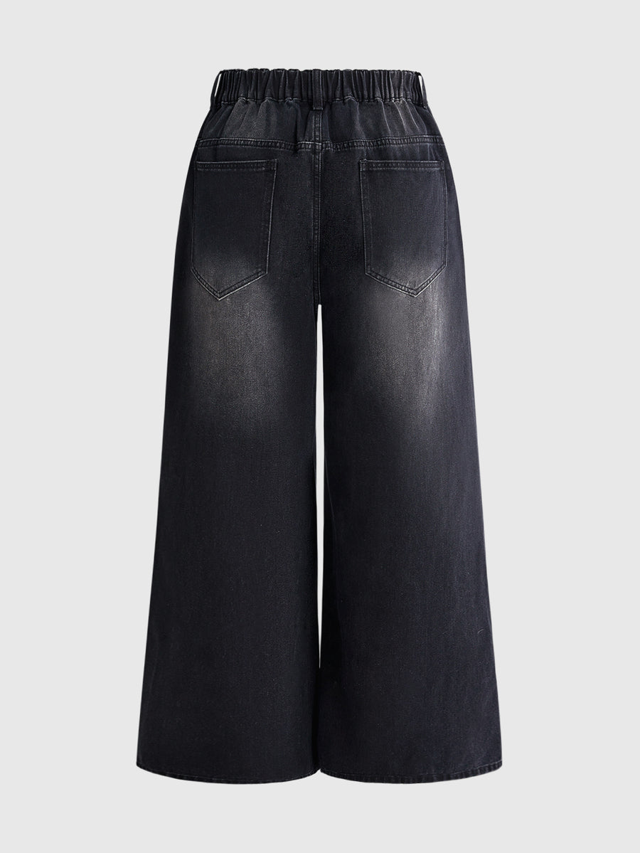 Women's gothic cross print baggy wide leg jeans made from denim with zipper fly and loose fit.